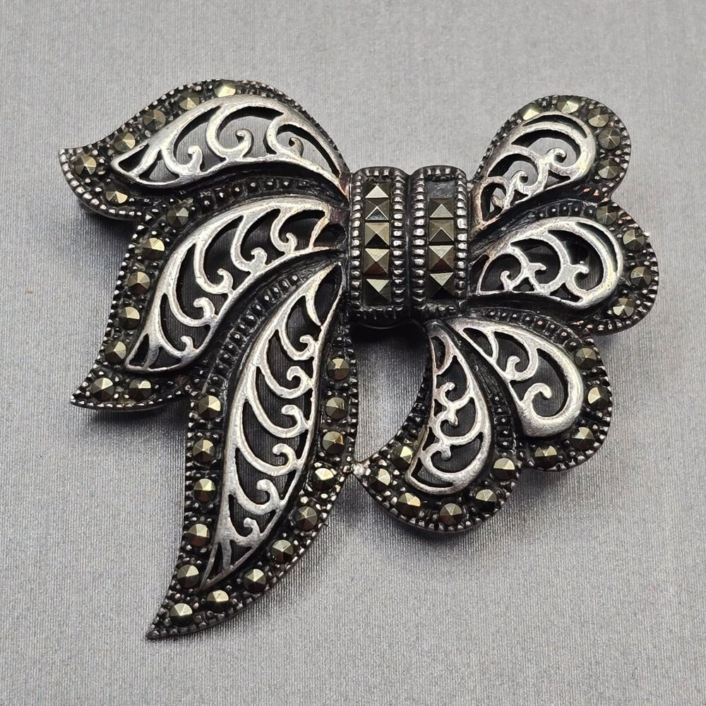 VTG Sterling Silver Marcasite Bow Brooch 1.5" Cutout Accents Signed NF 10.4g